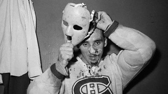 Jacques Plante Putting on Mask